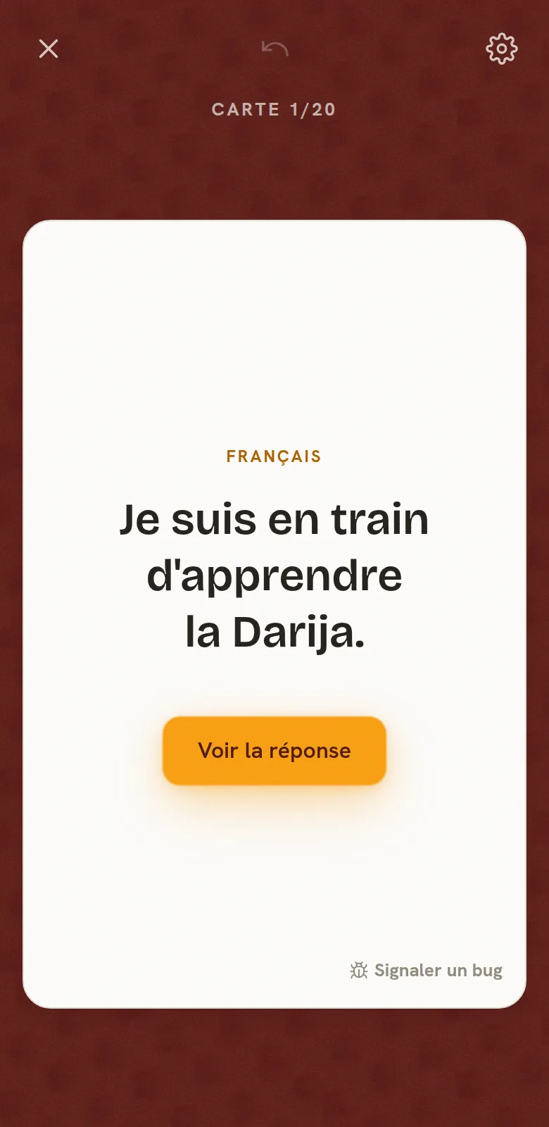 Écran de révision : une carte « Je suis en train d'apprendre la darija » côté français, bouton Voir la réponse